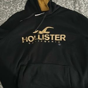 Black and gold Hollister hoodie